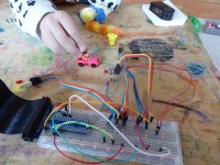 Safely crossed the street. Cars driving again.