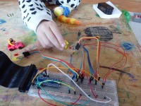 Cars have to stop, pedestrian may cross the road.